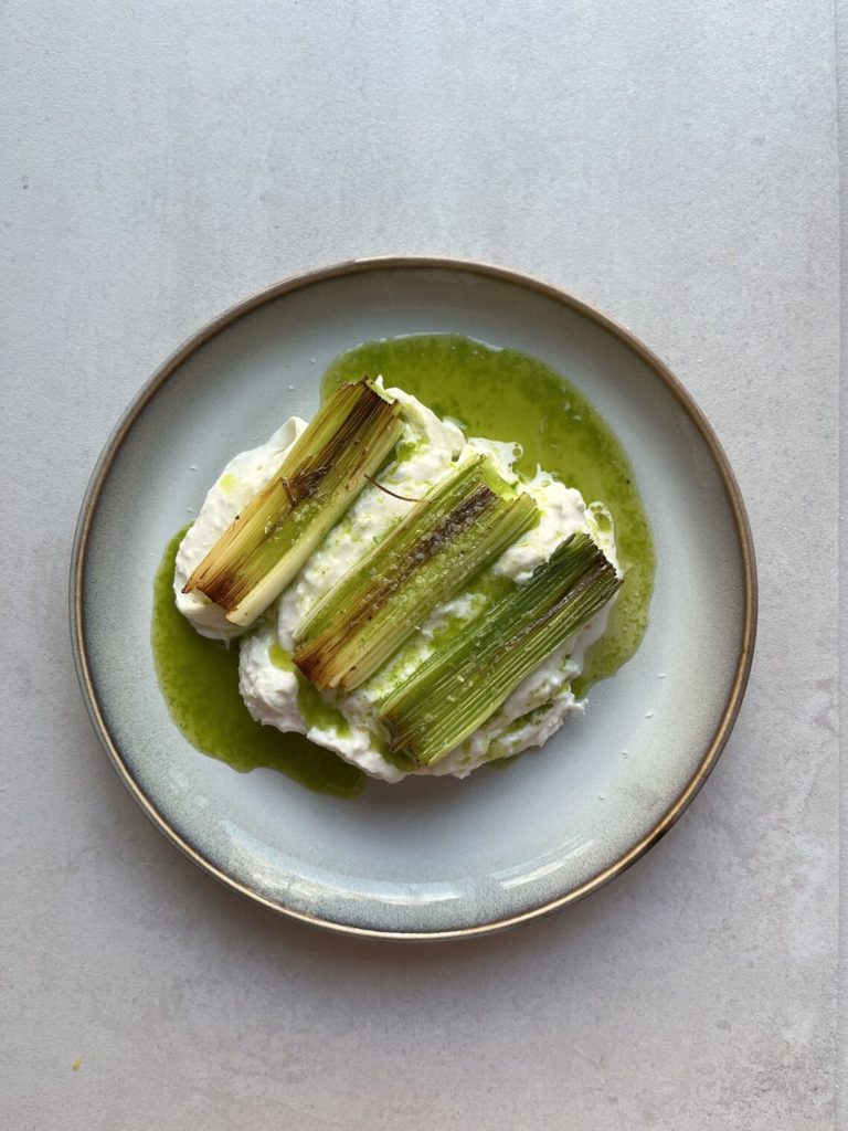 braised leeks with burrata and parsley oil